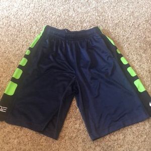 Navy blue and lime green Nike dri fit shorts